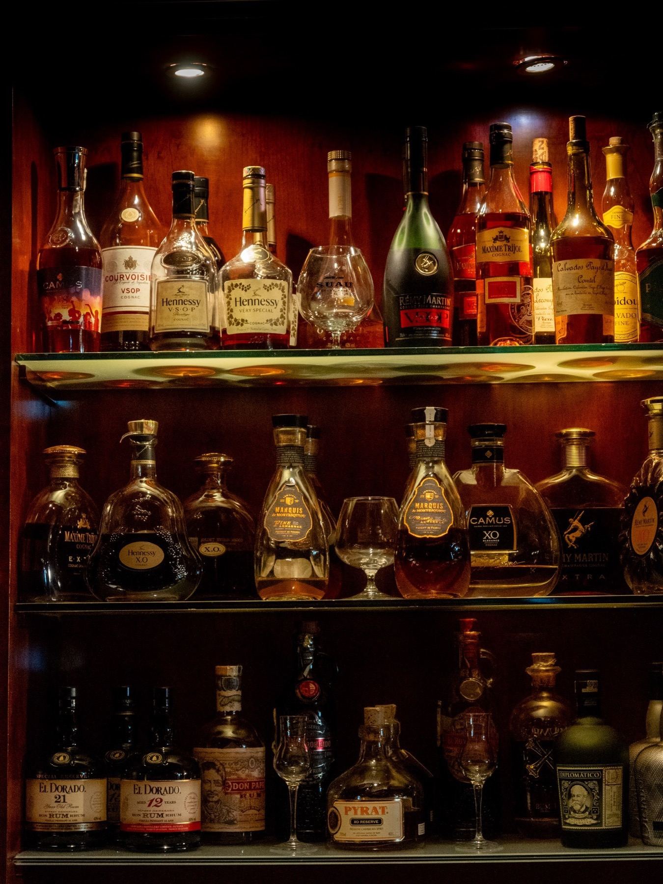 Signature cocktail poured behind the bar